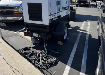 A generator is parked in a parking lot.