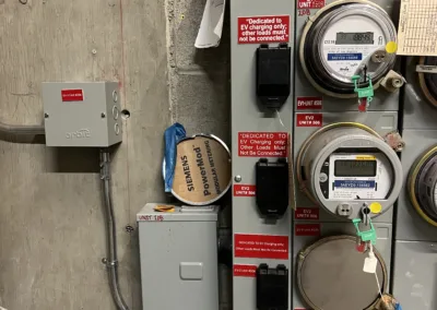 A meter panel with several meters attached to it.