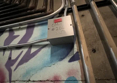 A metal pipes on a wall.