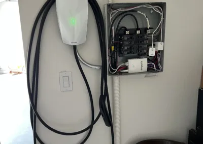 An electric car charging station in a room.